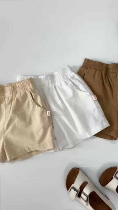 Quần sooc đùi linen kaki mềm bé trai bé gái unisex màu trắng nâu be BERNIE phong cách hàn quốc 7kg đến 30kg